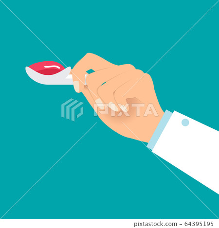 Doctor's Hand holding medicine syrup teaspoon. Doctor's Hand holding medicine syrup teaspoon. 64395195