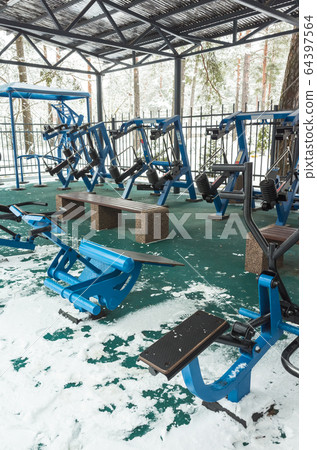 An outdoor gym covered with snow An outdoor gym covered with snow 64397564