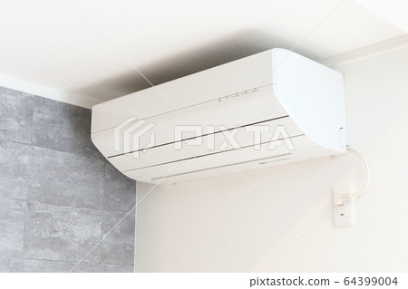 A new air conditioner installed in a new house A new air conditioner installed in a new house 64399004