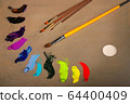 Oil painting. Palette with paints and brushes. The 64400409