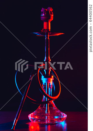 hookah shisha with coals on the table on a black background 64400562