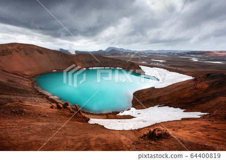 Drammatic view of the lake with turquoise water Drammatic view of the lake with turquoise water 64400819