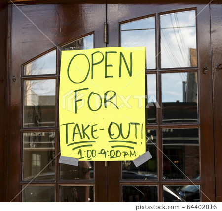 Open for take out poster taped on windows of Open for take out poster taped on windows of 64402016