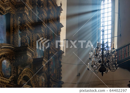 Wooden baroque iconostation inside old orthodox cathedral Wooden baroque iconostation inside old orthodox cathedral 64402297