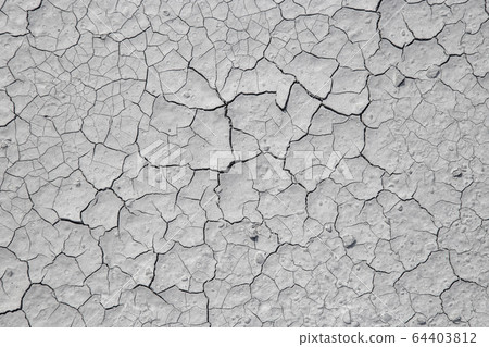 Dried cracked clay texture 64403812