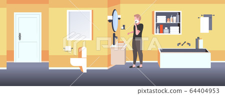 handsome man shaving face with foam skin care concept bathroom interior 64404953