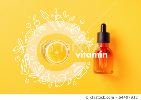 Glass bottle for cosmetics, serums and oils with vitamin C on yellow background Image with Doodle style icons image Flat lay Glass bottle for cosmetics, serums and oils with vitamin C on yellow background Image with Doodle style icons image Flat lay 64407938