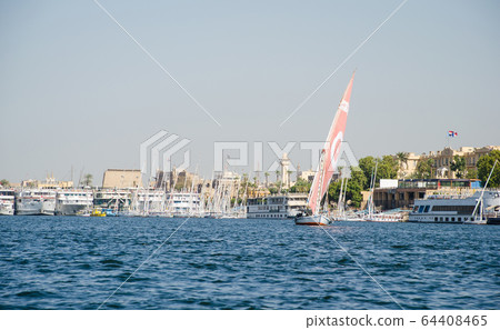 A felucca is a traditional wooden sailing boat A felucca is a traditional wooden sailing boat 64408465