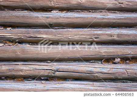 Wooden wall from logs as a background texture Wooden wall from logs as a background texture 64408563
