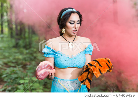 Stop animal killing concept - Pretty girl show animal skin that she wants to tell someone don't kill animals or stopped violence against animal. Stop animal killing concept - Pretty girl show animal skin that she wants to tell someone don't kill animals or stopped violence against animal. 64409459