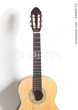 acoustic guitar isolated on white background 64409712