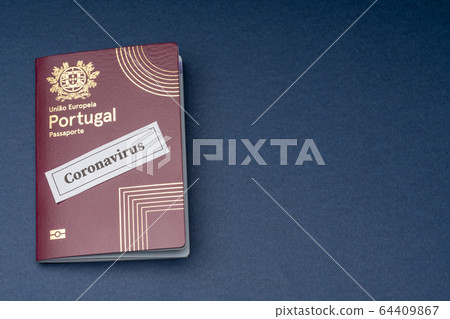 Portuguese European travel passport on a blue background. Portuguese European travel passport on a blue background. 64409867