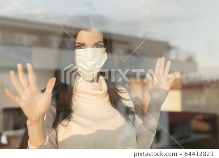 Young woman with veil, home isolation concept Young woman with veil, home isolation concept 64412821