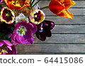 Colorful spring tulip flowers bouquet on grey 64415086