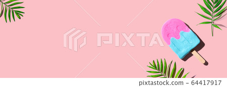 Popsicle with tropical plants 64417917