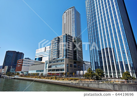 A view of the buildings of the firefly town from the waterhole Osaka Tadashi Bridge 64419696