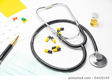 Top view of accessories healthcare  medical doctor and  hospital in problem protective COVID-19 concept 64420169