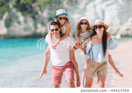 Young family on vacation have a lot of fun Young family on vacation have a lot of fun 64423769