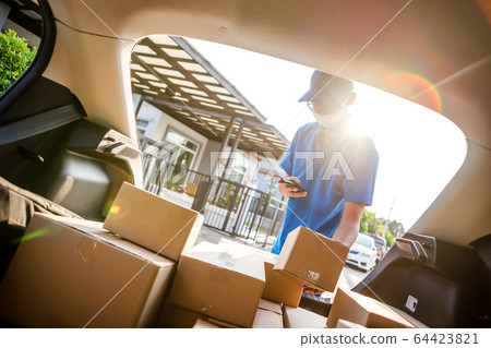 Asian delivery man wearing mask protect covid-19 Asian delivery man wearing mask protect covid-19 64423821