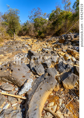 dry stone riverbed, Ankarana Madagascar, Africa 64424919