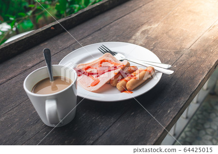 Breakfast Ham, Sausage and Coffee On a wooden Breakfast Ham, Sausage and Coffee On a wooden 64425015