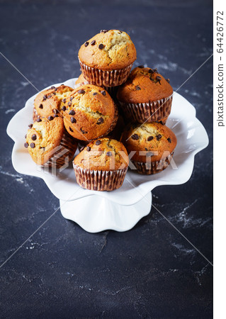 close-up of sweet Banana chocolate chip muffins close-up of sweet Banana chocolate chip muffins 64426772