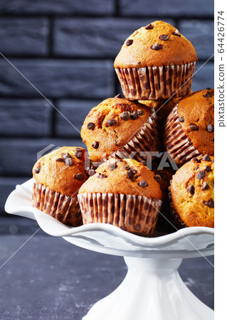 close-up of sweet Banana chocolate chip muffins close-up of sweet Banana chocolate chip muffins 64426774