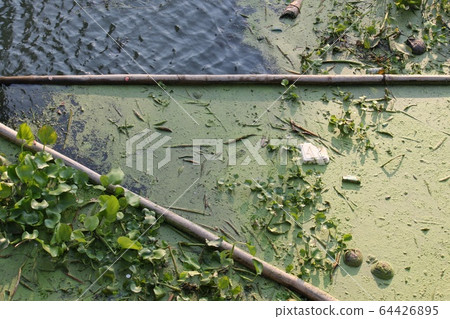 Garbage such as foam boxes, milk boxes, plastic bags, leaf debris are thrown into the river. Which may cause pollution, resulting in unclean air, river water will spoil. Garbage such as foam boxes, milk boxes, plastic bags, leaf debris are thrown into the river. Which may cause pollution, resulting in unclean air, river water will spoil. 64426895