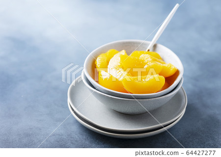 Sweet canned peaches Sweet canned peaches 64427277