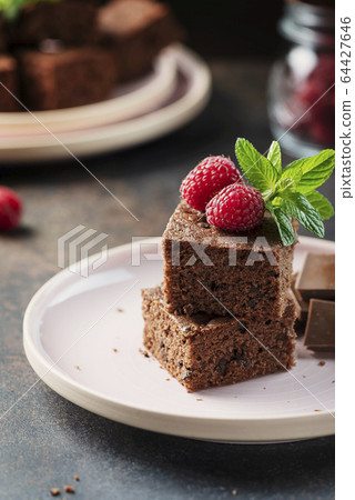 Pieces of a chocolate cake 64427646