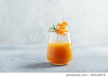 Healthy fresh juice with carrot Healthy fresh juice with carrot 64428074