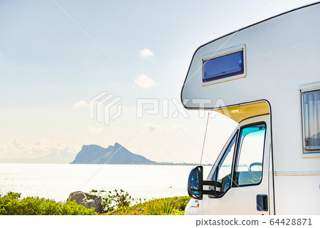 Caravan on spanish coast, Gibraltar rock on 64428871