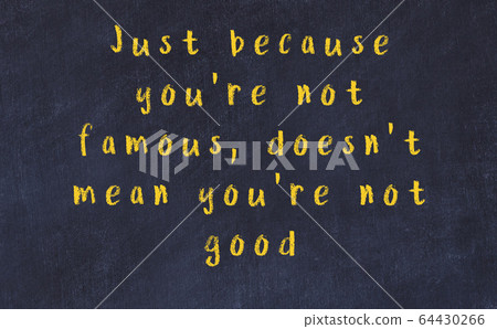 Chalk inscription of smart quote on black desk Chalk inscription of smart quote on black desk 64430266