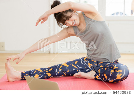 Female yoga fitness home laptop 64430988