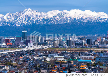 《Toyama Prefecture》 Scenery of Toyama City with a view of the Tateyama Mountain Range 64431333