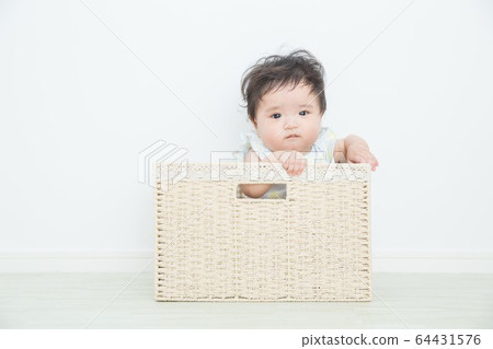 Baby in the basket Baby in the basket 64431576