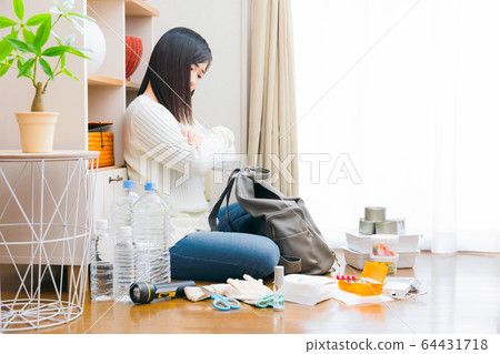Disaster preparedness Women's items, goods copy space to prepare for emergencies 64431718