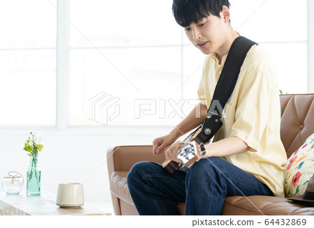 Male guitar 20s Male guitar 20s 64432869