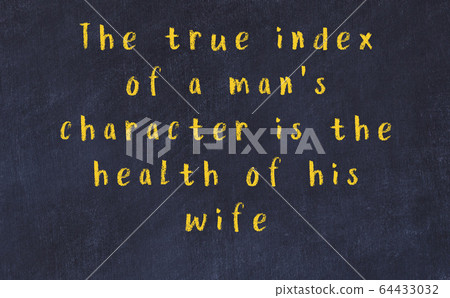Chalk inscription of smart quote on black desk Chalk inscription of smart quote on black desk 64433032