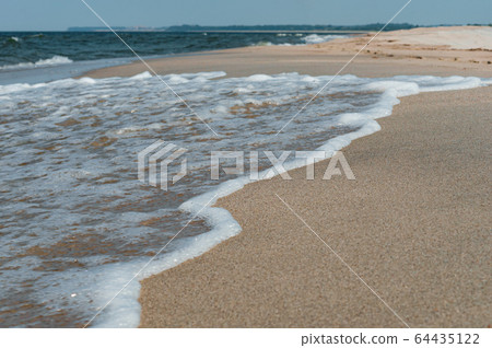 small waves on the sea, ships on the sea horizon, 64435122