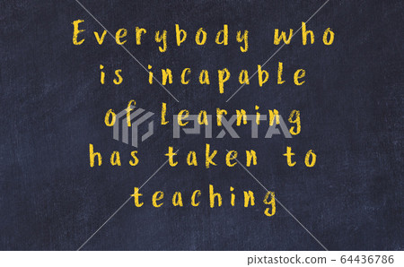 Chalk wise inscription on black chalkboard Chalk wise inscription on black chalkboard 64436786