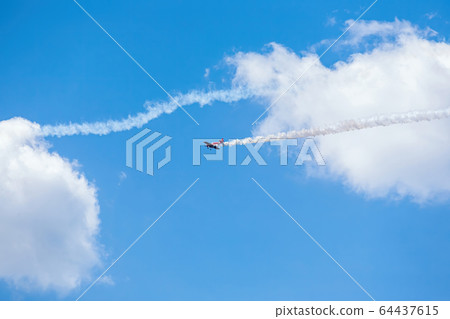 sport aircraft perform acrobatics at air shows 64437615
