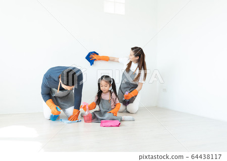 Smiling Happy Man, Woman, Kid girl wear orange Smiling Happy Man, Woman, Kid girl wear orange 64438117