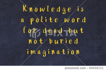 Chalk inscription of smart quote on black desk Chalk inscription of smart quote on black desk 64438131