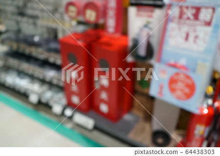 Blurred image of fire extinguisher department Blurred image of fire extinguisher department 64438303