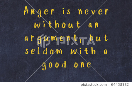 Black chalkboard with wise inscription on it 64438582