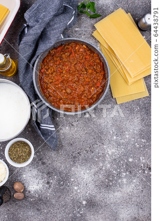 Ingredients for cooking lasagna Bolognese 64438791