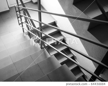 Stainless steel, glass and wood railing.Fall Protection. modern design of handrail and staircase Stainless steel, glass and wood railing.Fall Protection. modern design of handrail and staircase 64438884