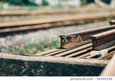 Close up rusty rails for railway construction,stack of metal rusty Close up rusty rails for railway construction,stack of metal rusty 64440199