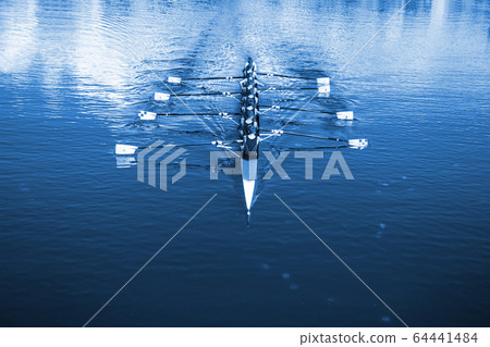 Boat coxed eight Rowers rowing on the tranquil Boat coxed eight Rowers rowing on the tranquil 64441484